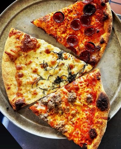 Three pizza slices, pepperoni, white, and sausage